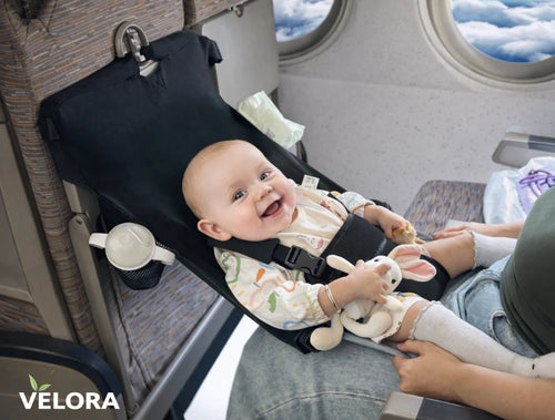 Velora™ – Babyflyghängmattan som skyddar ditt barns ryggrad samtidigt som du får båda händerna fria